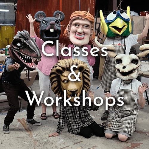 Photo of 6 people together who made masks and are wearing them from a workshop they attended at Factory163. Text overtop says "Classes & Workshops".