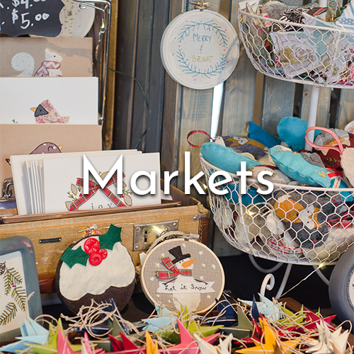 Shot of a stand in a factory163 market. Displaying artist made products.